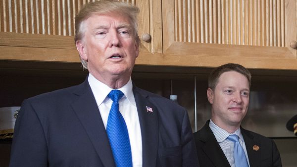 Matt Matt Pottinger and Donald Trump. (Jim Watson/AFP/Getty Images)