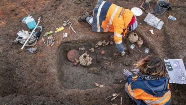 French archeologists dig at an ancient child burial site recent at the Clermont-Ferrand Airport. France's National Institute of Preventive Archaeological Research said Thursday the site dates back 2,000 years. (Photo courtesy of National Institute of Preventive Archaeological Research Twitter) French archeologists dig at an ancient child burial site recent at the Clermont-Ferrand Airport. France's National Institute of Preventive Archaeological Research said Thursday the site dates back 2,000 years. (Photo courtesy of National Institute of Preventive Archaeological Research Twitter)