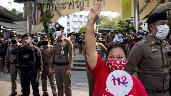 A woman protesting against section 112 of Thailand's penal code, which deals with lese majeste at Victory Monument in Bangkok on January 16 Jack TAYLOR AFP/File