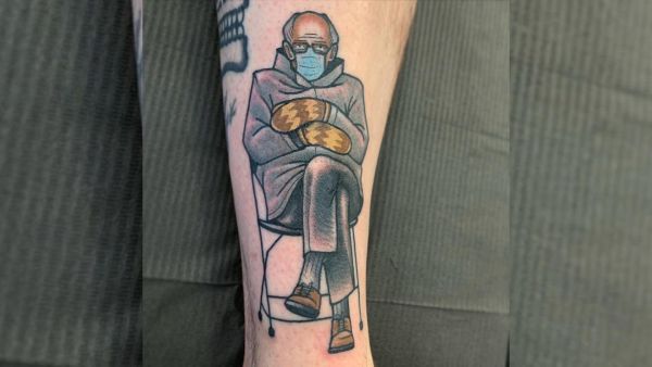 The tattoo shows the 79-year-old senator sitting on a chair with his arms folded over, while wearing thick mittens and socially distancing himself from others. (Instagram)