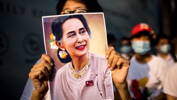 A protester holds a photo of detained Myanmar civilian leader Aung San Suu Kyi during a demonstration against the military coup outside the Myanmar Embassy in Bangkok on February 7, 2021. Jack TAYLOR / AFP
