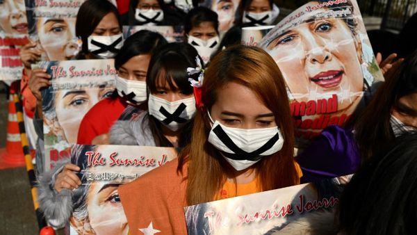 Activists take part in a protest against the military coup in Myanmar in Tokyo on February 14, 2021. CHARLY TRIBALLEAU / AFP