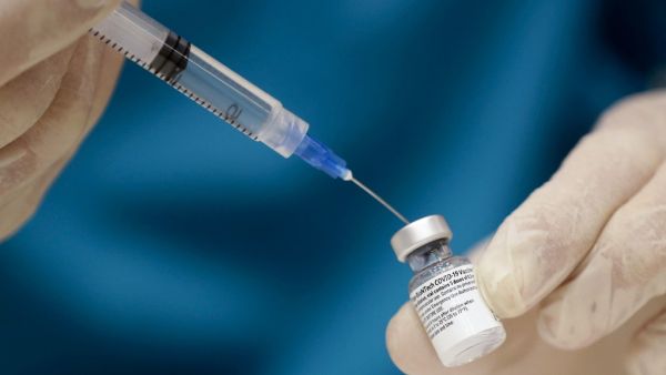 A medic prepares a dose of the COVID-19 Pfizer/BioNTech vaccine at Lebanon's American University Medical Center in the capital Beirut, on February 14, 2021, as the country kickstarts its inoculation campaign. Lebanon gave its first COVID-19 vaccine dose to a doctor, as it started inoculation it hopes will keep the pandemic in check amid a deepening economic crisis. ANWAR AMRO / AFP