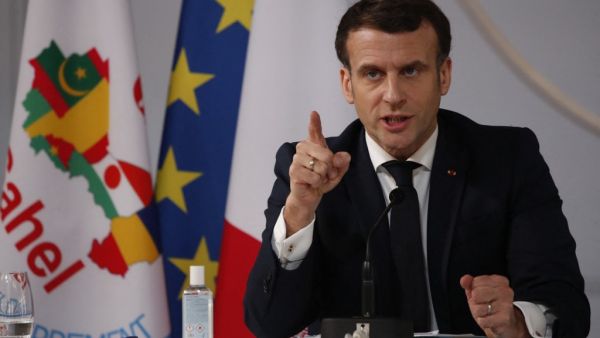 French President Emmanuel Macron speaks after a meeting with leaders of the G5 Sahel, via visio-conference, in Paris, on February 16, 2021. Francois Mori / POOL / AFP