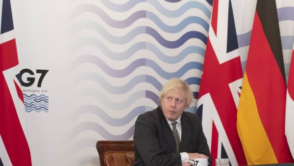 Britain's Prime Minister Boris Johnson hosts a virtual meeting of G7 leaders in the Cabinet Room at Downing Street in London on February 19, 2021. Johnson urged global leaders to move as one in ensuring coronavirus vaccines reach everyone around the world, including the poor. Geoff Pugh / POOL / AFP