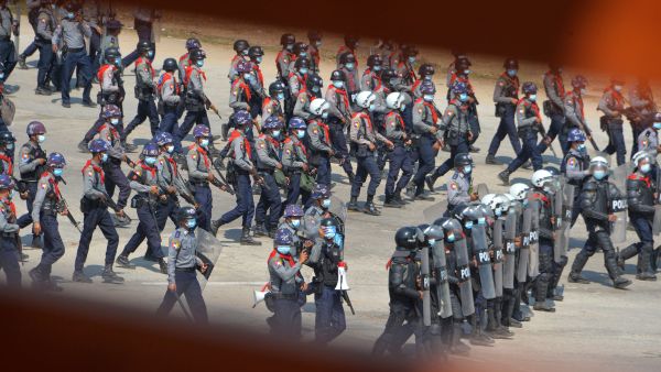 Police prepare to disperse protesters taking part in a demonstration against the military coup in Naypyidaw on February 22, 2021. STR / AFP