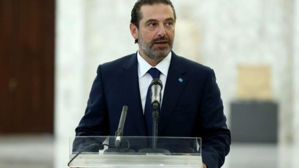 Prime Minister of Lebanon Saad Hariri speaks at a press conference after meeting President Michel Aoun at the presidential palace, last August. (AFP)