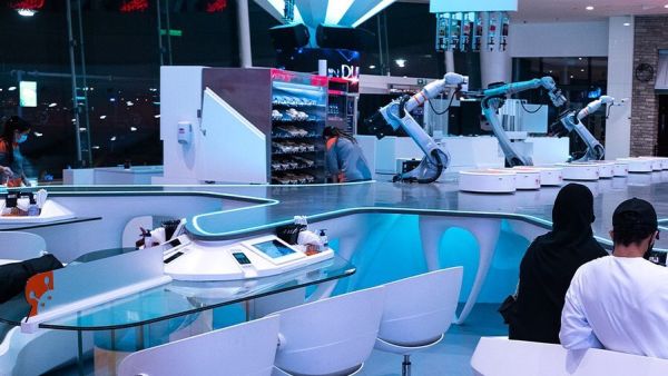 Customers can place their orders with German-made robots, who then prepare and deliver it straight to their tables. (Instagram/ @robo.cafe)
