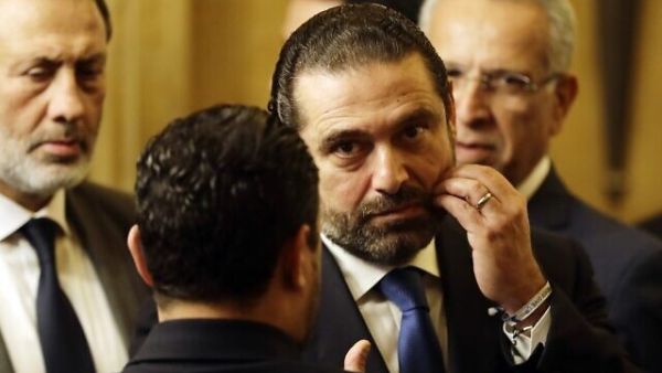 Saad Hariri (C) listens!