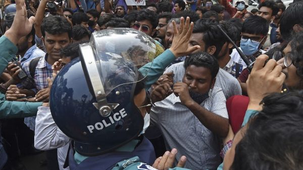 Activists scuffle with police 