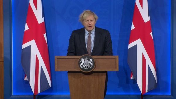 Boris Johnson gives a press conference in a new-look 