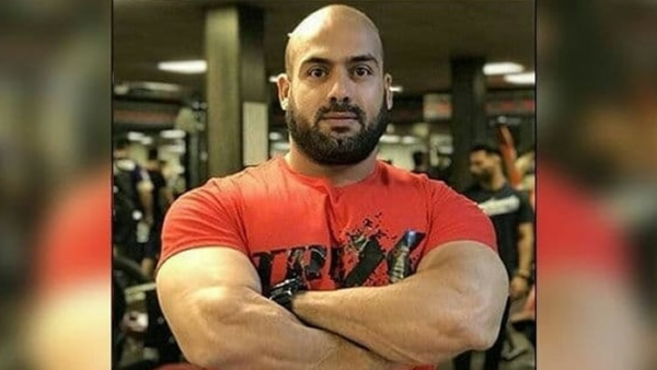 Iranian bodybuilder stitched his lips in protest 