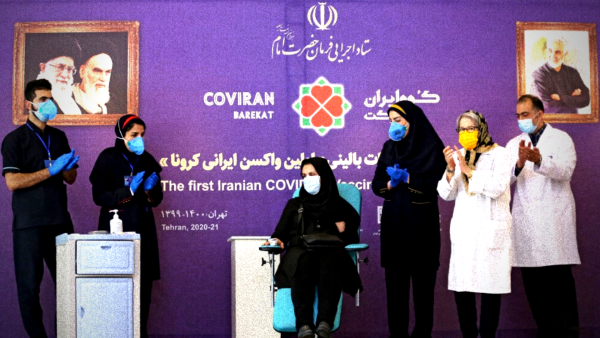 Iranian woman recieving the Fakhra vaccine 