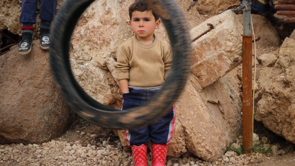 Three children killed and 15 injured as fire breaks out in crowded camp.