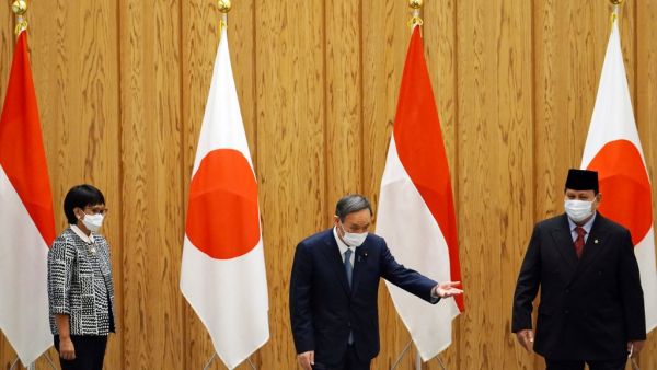 Prime Minister Yoshihide Suga urged to resign as new Japanese poll show