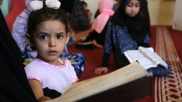 students attend a Quran course