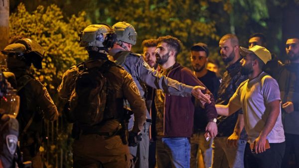 Palestinian protesters confront Israeli police in Sheikh Jarrah in east Jerusalem