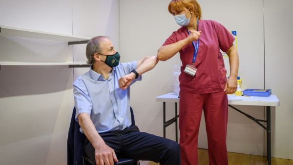 Irish Prime Minister Micheal Martin (L) bumps elbows with Brenda Dillon, assistant director of nursing at Health Service Executive (HSE) after receiving his first dose of the AstraZeneca/Oxford vaccine against the coronavirus covid-19, at the vaccination centre at City Hall in Cork on May 9, 2021. Daragh McSweeney / POOL / AFP EU has not placed any new orders for AstraZeneca vaccines