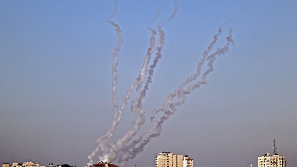 Some rockets fired towards Israel by Palestinian Islamist movement Hamas billows in the air in Gaza City 