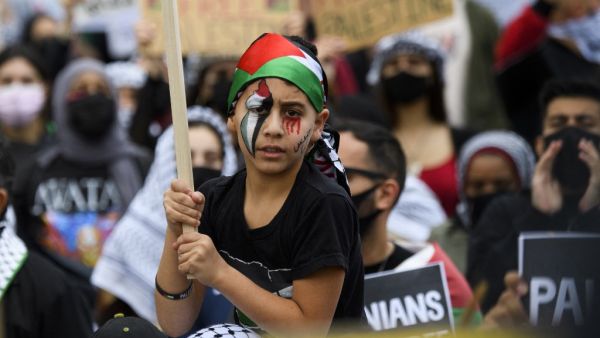A young demonstrator painted his face with the colors of the Palestine flag as people demonstrate in support of Palestine during the Los Angeles Nakba 73: Resistance Until Liberation rally and protest from the US Federal Building to the Consulate of Israel 