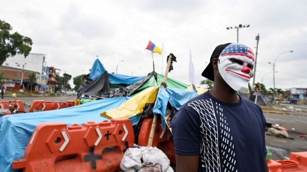 Death toll in Colombia protests hits 13