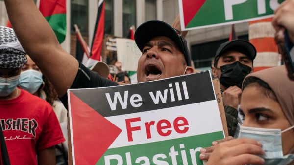 Protesters demanding an end to Israeli aggression against Palestine rally in Midtown Manhattan on May 11, 2021 in New York City. Recent violence between the Israeli military and Palestinians in Jerusalem has left dozens dead as activists around the world denounce attacks on the city's Al-Aqsa Mosque