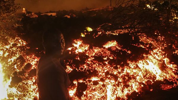 Thousands of residents of east Democratic Republic of Congo return to Goma, after the river of lava from the eruption of Mount Nyiragongo volcano halts