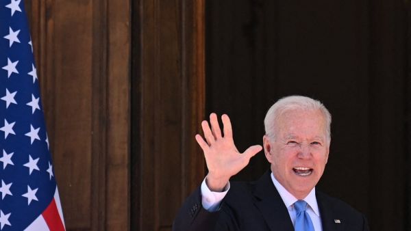 US President Joe Biden waves at press as he arrives to the US-Russia summit at the Villa La Grange, in Geneva on June 16, 2021. Brendan Smialowski / AFP EU, US say sanctions removal constitutes ‘essential part’ of Iran nuclear deal