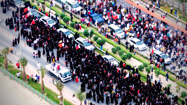 Bahraini children were taking part in a celebration commemorating the anniversary of their Arab Spring protests. (Shutterstock: Arnaud Martinez) 2011 protest in Manama, Bahrain