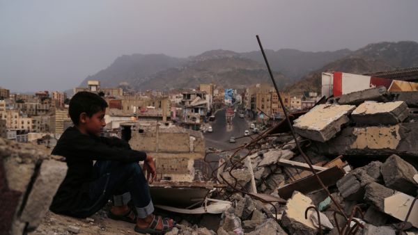 A child from Taiz City sits on the ruins of his ruined home because of the war on city-Yemen. (Shutterstock) A child from Taiz City sits on the ruins of his ruined home because of the war on city-Yemen.