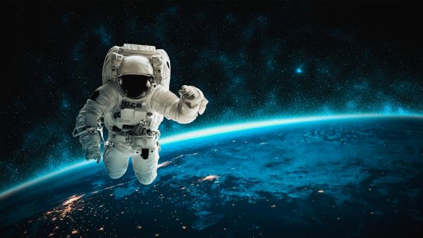 Astronaut spaceman do spacewalk while working 