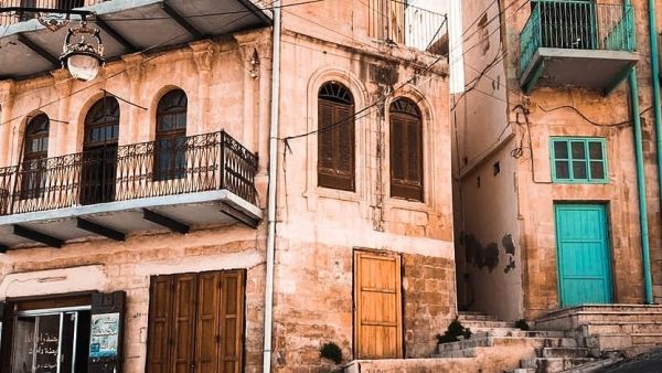 Salt is a hillside town near Amman, Jordan. Its significance as an Ottoman Empire trading hub is reflected in its Ottoman architecture. The early-20th-century Abu Jaber mansion, now the Historic Old Salt Museum, has Italian frescoed ceilings. An Ottoman mosque overlooks Hammam Street with its food market.