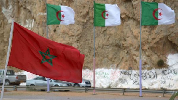 Moroccan and Algerian flags on their border 