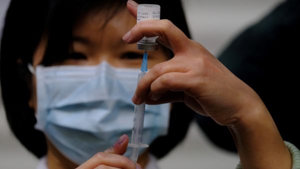 Taiwan's president receives domestically produced COVID-19 vaccine