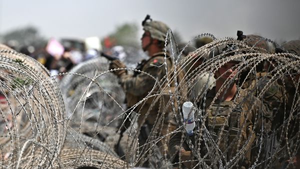 Fears of an ISIS suicide bombing at Kabul airport rise amid foreign troops' presence.
