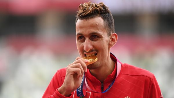 First-placed Morocco's Soufiane El Bakkali celebrates on the podium with his gold medal after competing in the men's 3000m steeplechase event during the Tokyo 2020 Olympic Games at the Olympic Stadium in Tokyo on August 3, 2021. (Photo: AFP) First-placed Morocco's Soufiane El Bakkali celebrates on the podium with his gold medal after competing in the men's 3000m steeplechase event during the Tokyo 2020 Olympic Games at the Olympic Stadium in Tokyo on August 3, 2021. (Photo: AFP)