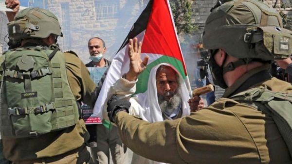 Clashes between Israeli forces and Palestinian demonstrators in Hebron during protests marking 27th anniversary of Ibrahimi Mosque massacre