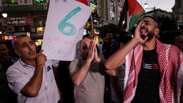 Demonstrators take part in a protest in support of Palestinian prisoners 
