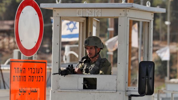 14 Palestinians jailed in West Bank raids