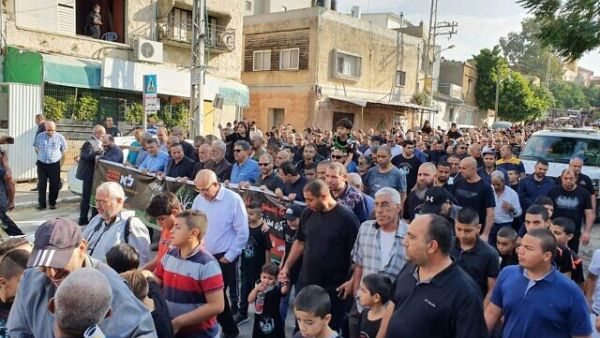 Hundreds marching through Kafr Qasim on October 29, 2019, to mark the 1956 massacre in which Border Police shot and killed 48 Arab Israelis. (Courtesy: Joint List)