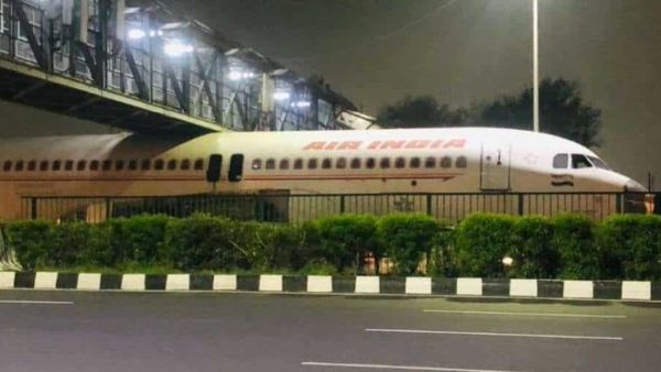 Air India plane stuck under bridge