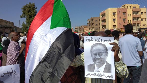ousted prime minister is currently on his way to the royal palace to meet Al-Burhan