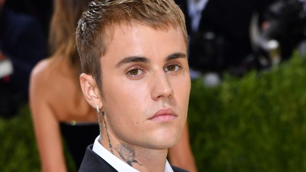 Bieber wore a red outfit for the performance and both he and the audience looked thrilled. 