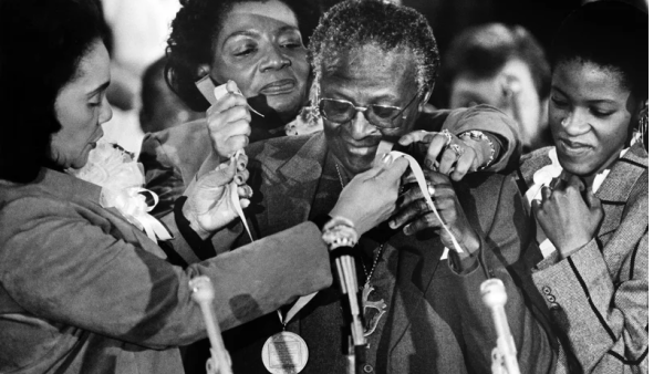 Desmond Tutu and his daughters 