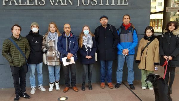 Ismail Ziada, (4th From L), with supporters outside Hague court