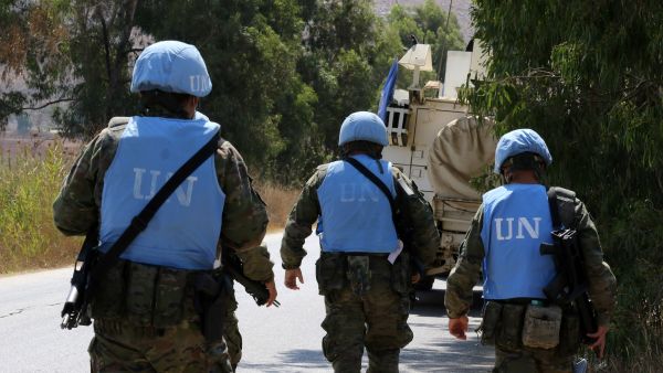 Members of United Nations Interim Force in Lebanon (UNIFIL) patrol in the southern Lebanese Khiam area near the border with Israel, on August 7, 2021. (Photo by Mahmoud ZAYYAT / AFP) maritime borders