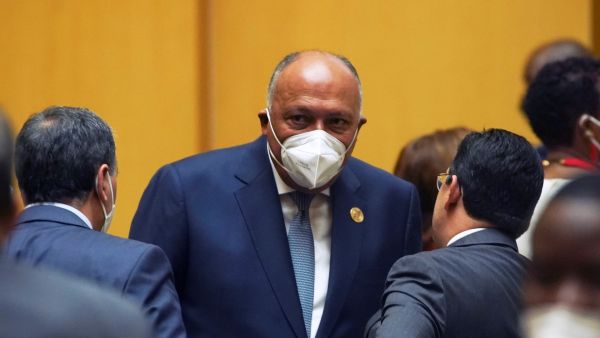 Egypt's Foreign Affairs Minister Sameh Hassan Shoukry (C) attends the 35th Ordinary Session of the African Union (AU) Summit in Addis Ababa, Ethiopia, on February 5, 2022. (Photo by Amanuel Sileshi / AFP) Egypt's Foreign Minister