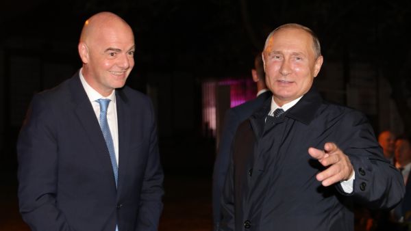 Russia's President Vladimir Putin (R) welcomes FIFA President Gianni Infantino upon his arrival to the far-eastern Russian port of Vladivostok on September 4, 2019, ahead of the start of the Eastern Economic Forum hosted by Russia. / AFP / SPUTNIK / Mikhail Klimentyev