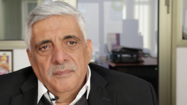 الصحفي الأردني داود كتاب