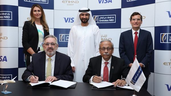 بنك الإمارات دبي الوطني وبرنامج "ضيف الاتحاد" يتعاونان لإطلاق بطاقات ائتمانية جديدة بعلامات تجارية مشتركة
